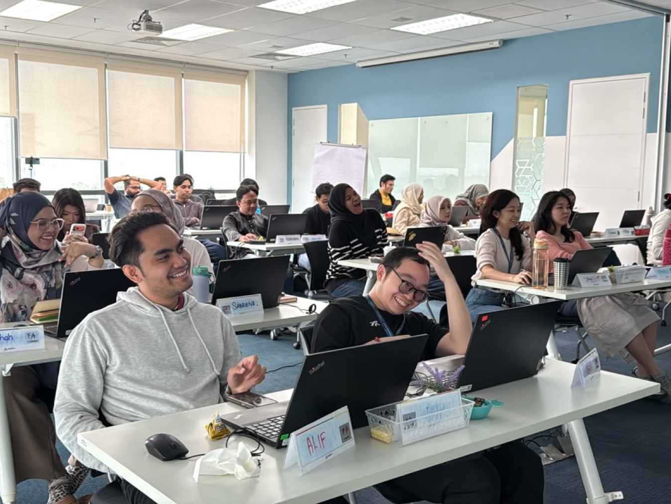 Participants and trainer after an AI leadership workshop